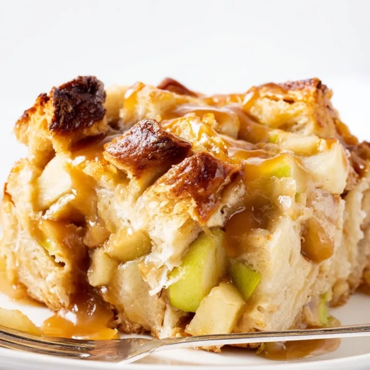 Golden brown Caramel Apple Breakfast Bake, warm spices fill the air, ready to serve.