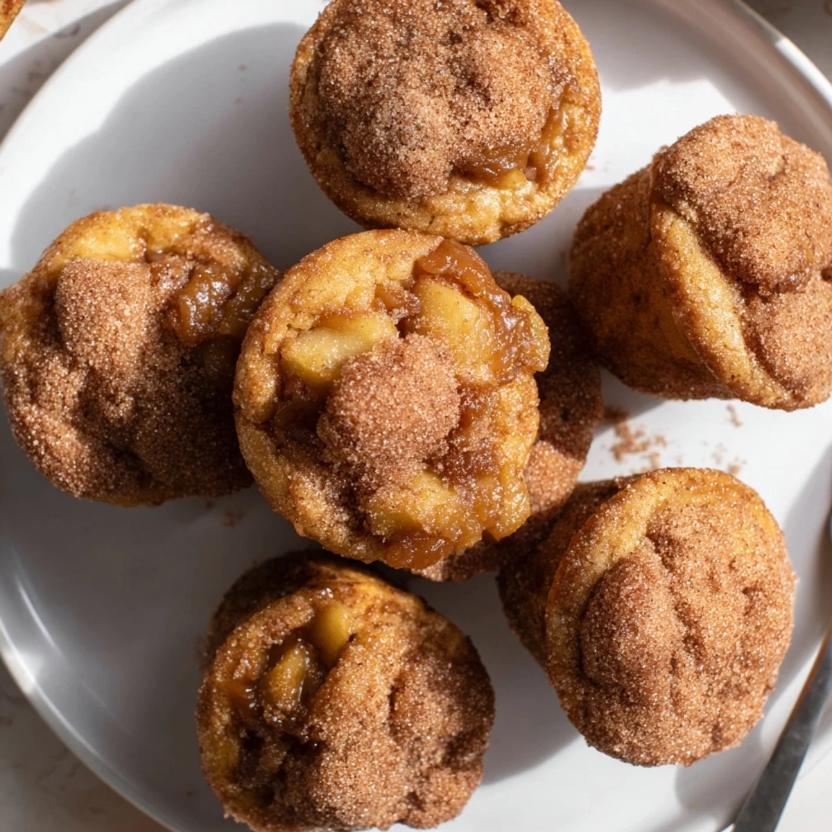 Warm Bourbon Muffin Bites drizzled with caramel, an ideal autumn dessert treat.