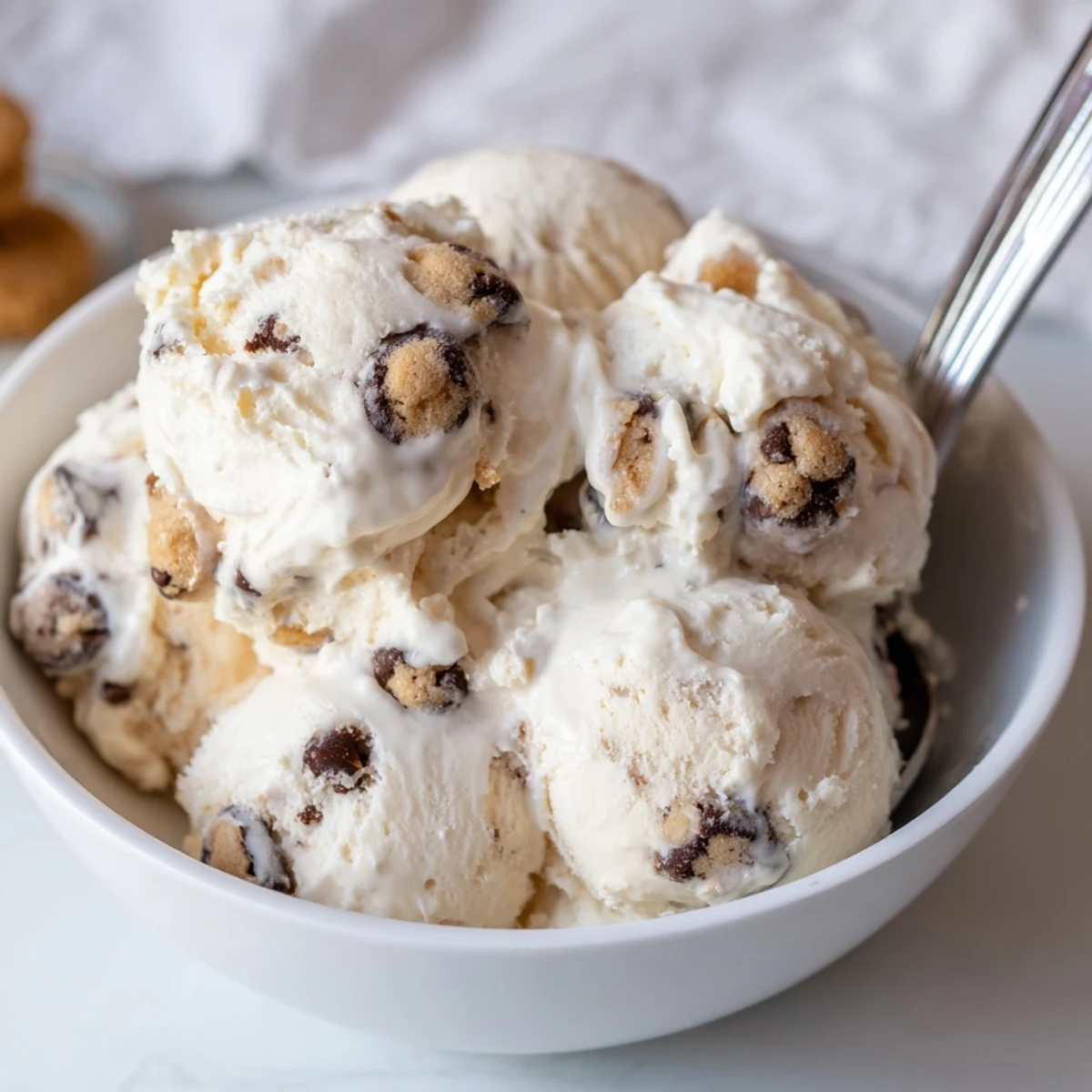 Indulge in cottage cheese ice cream mixed with rich edible cookie dough.  