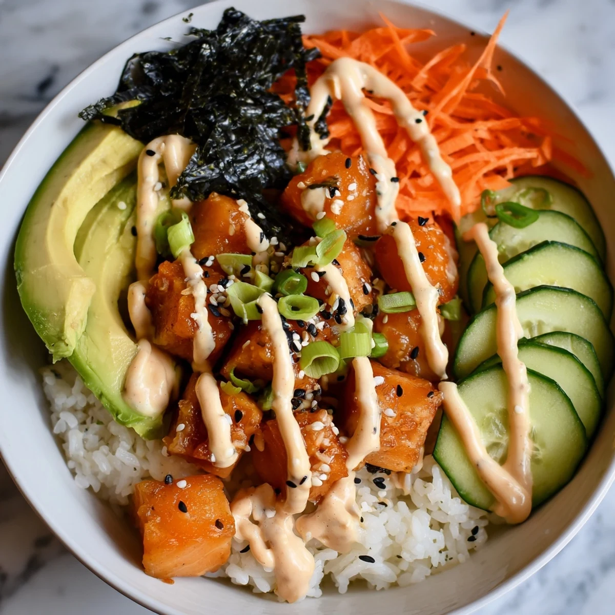 Golden-brown crispy salmon bites bowl, a colorful plate of fresh flavors over fluffy rice.