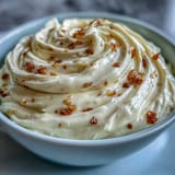 Silky, garlicky aioli with a tangy lemon twist, ideal as a spread for sandwiches or a sauce for roasted vegetables.