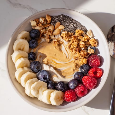 Creamy Protein Peanut Butter Breakfast Bowl ready to eat, a healthy and delicious morning treat.