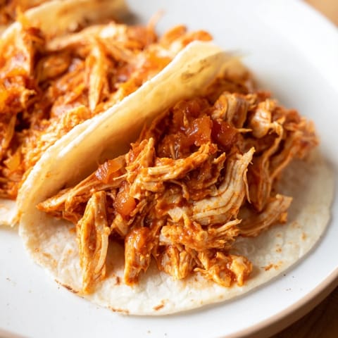Tender shredded chicken tacos
