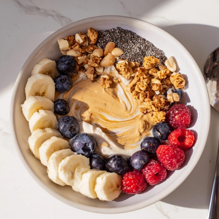 Creamy Protein Peanut Butter Breakfast Bowl ready to eat, a healthy and delicious morning treat.