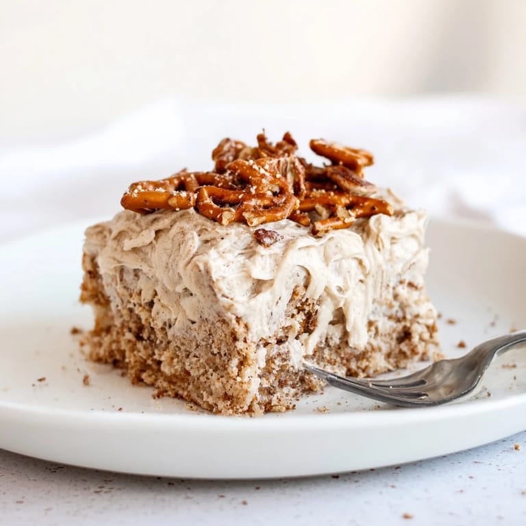 Delicious Root Beer Pretzel Cinnamon Sheet Cake served warm, ideal for dessert lovers.  