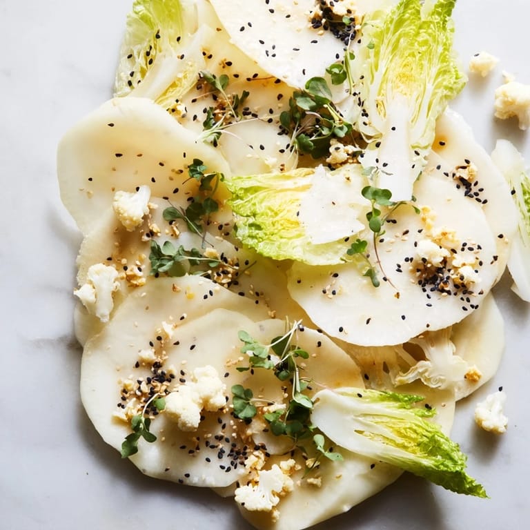 Imagine the "Tundra Trek": a chilled, artistic salad bursting with fresh, vibrant flavors and textures.